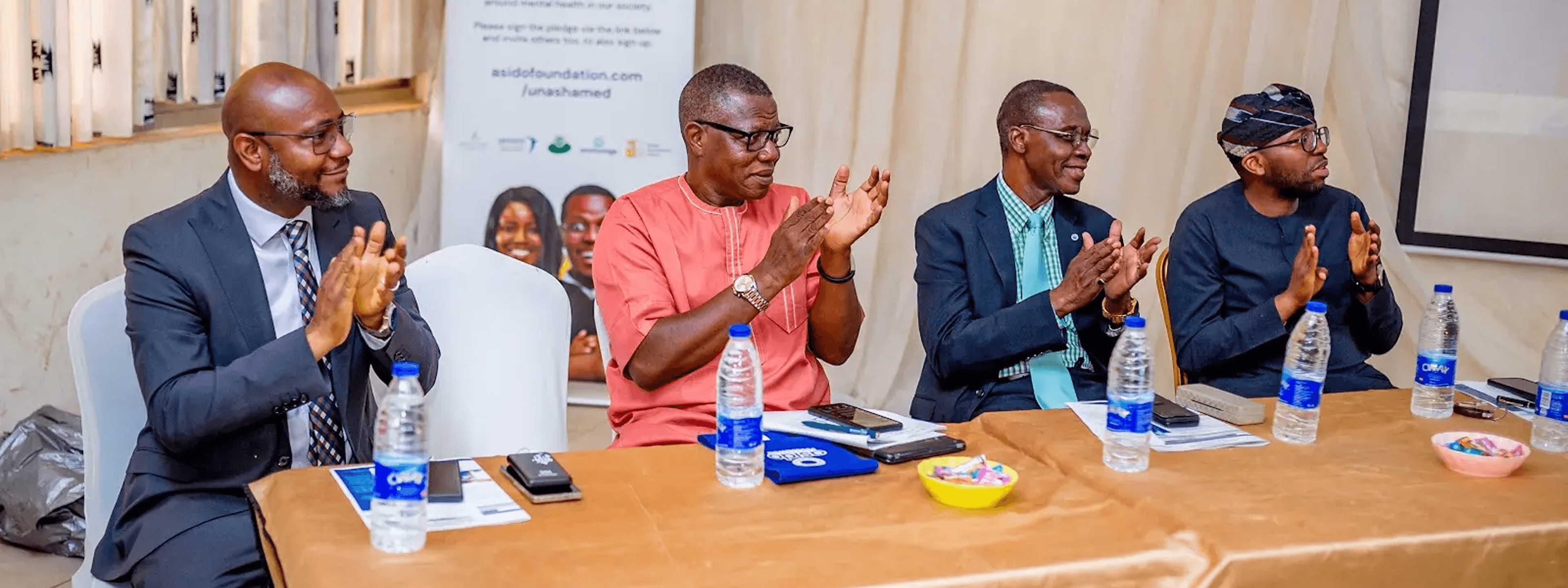 Asido Foundation team members at a mental health awareness event